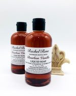 Two semi-transparent brown liquid soaps with white labels that read "Rachel Rene: Handmade Bath & Body - Bourbon Vanilla. Liquid Soap - Body Wash - Shampoo - Bubble Bath." They have black pull top caps and sit on a white background.