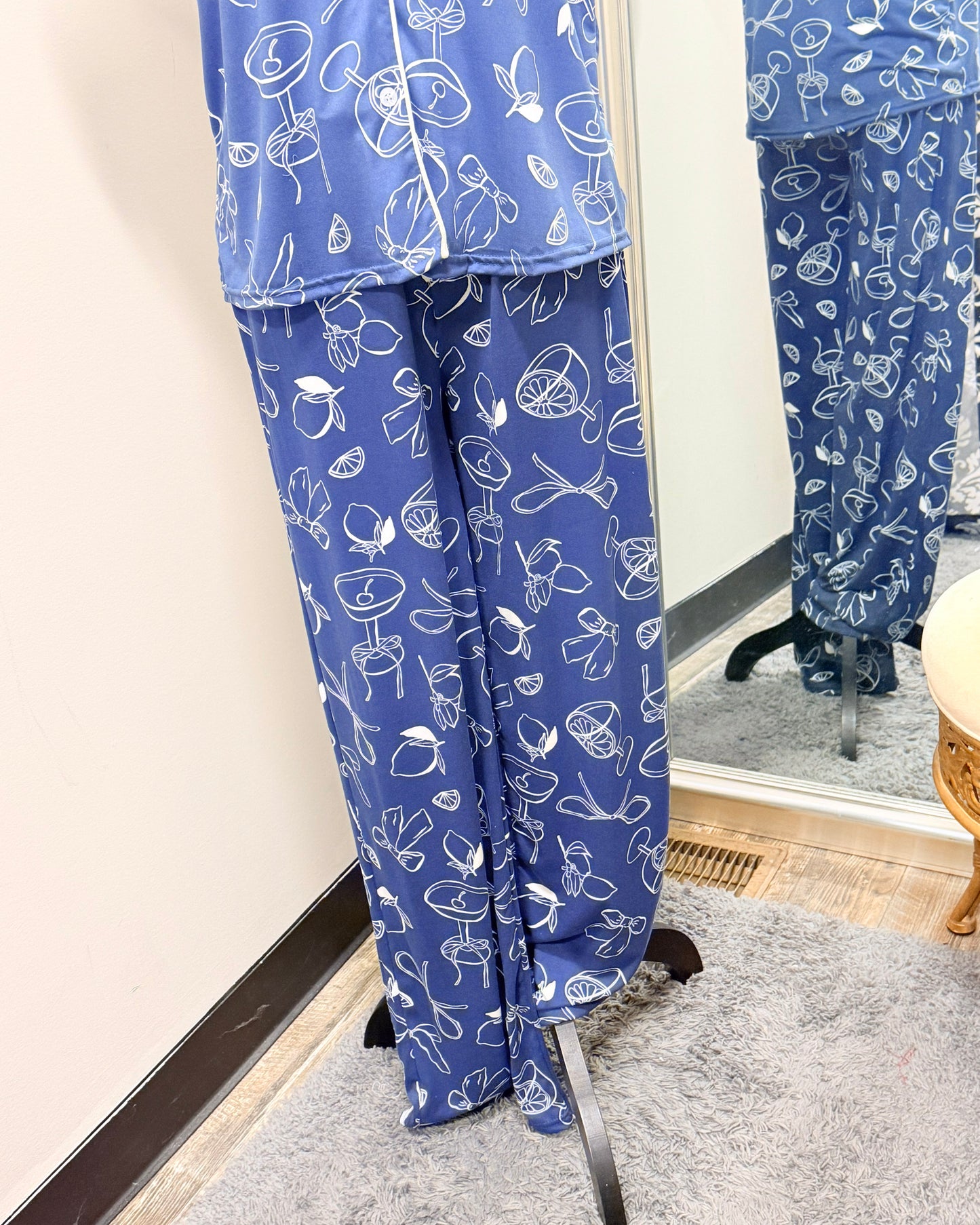 Blue pajama set with white patterns on a mirror background