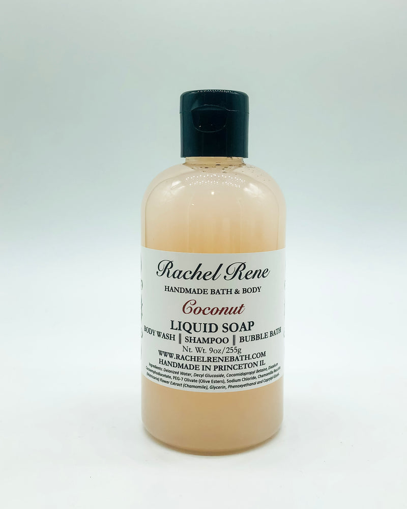 A cloudy cream-colored liquid soap with a white label that reads "Coconut." It has a black pull top cap and sits on a white background.