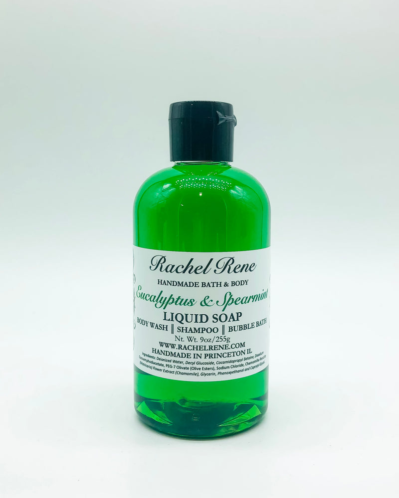 A semi-transparent green liquid soap with a white label that reads "Eucalyptus & Spearmint." It has a black pull top cap and sits on a white background.