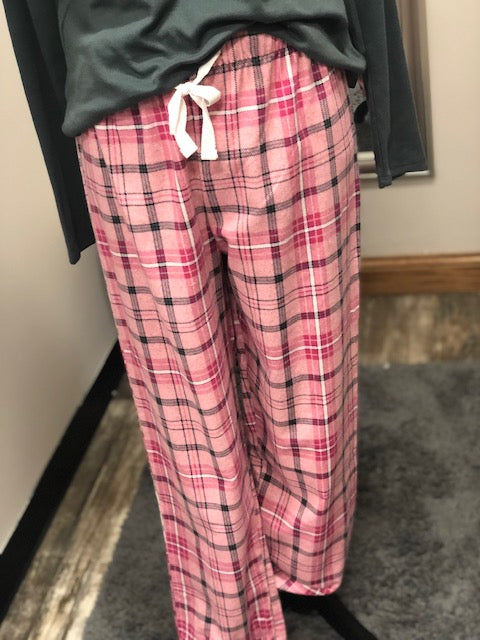 Pink plaid pajama pants with black, white, and hot pink detailing.